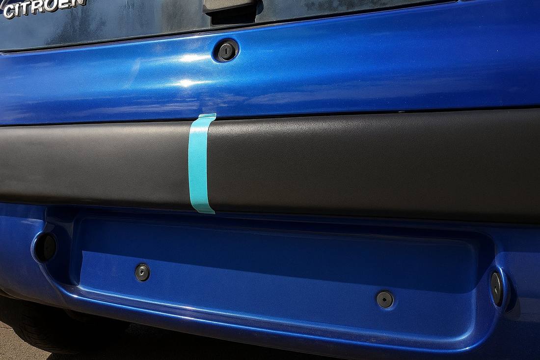 Car bumper before and after restoration