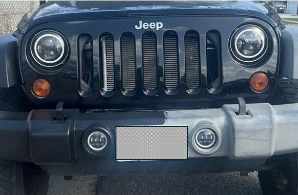 Before and after plastic trim restoration on a Jeep